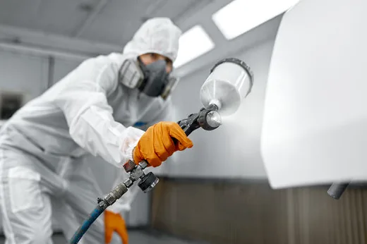 Spray finishing doors in a Valencia shop